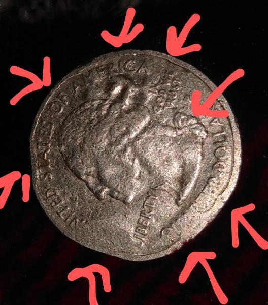 2007 washington state quarter the arrows point to…