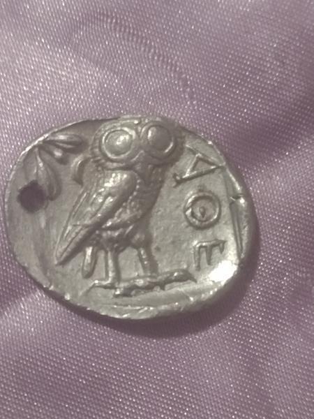 Ancient coin from Athens that was made into…