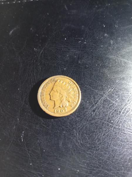 1907 indian head pennie is this coin in…