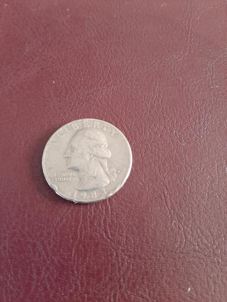 1983 quarter looks chipped on the inside. The…