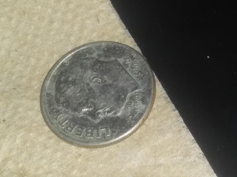 2000 D dime is not centered.
