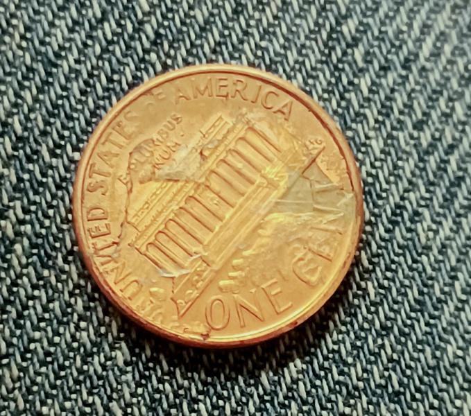 Double stamped flip1991 penny. The pics don't do…