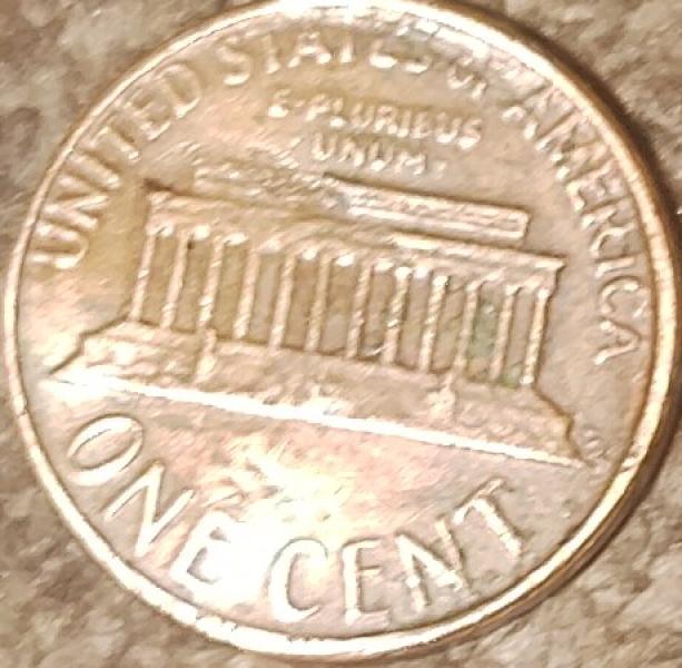 1977d penny that has the word state imprinted…