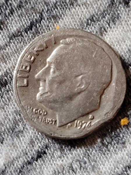 1976 D dime with a possible clipped planchette…