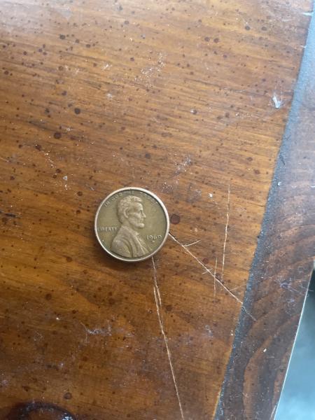 1969 D penny missing initials.