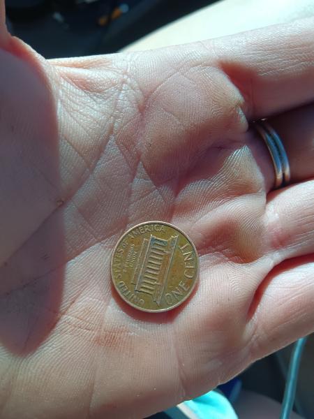 1974 s penny and 1986 d penny with mint errors.