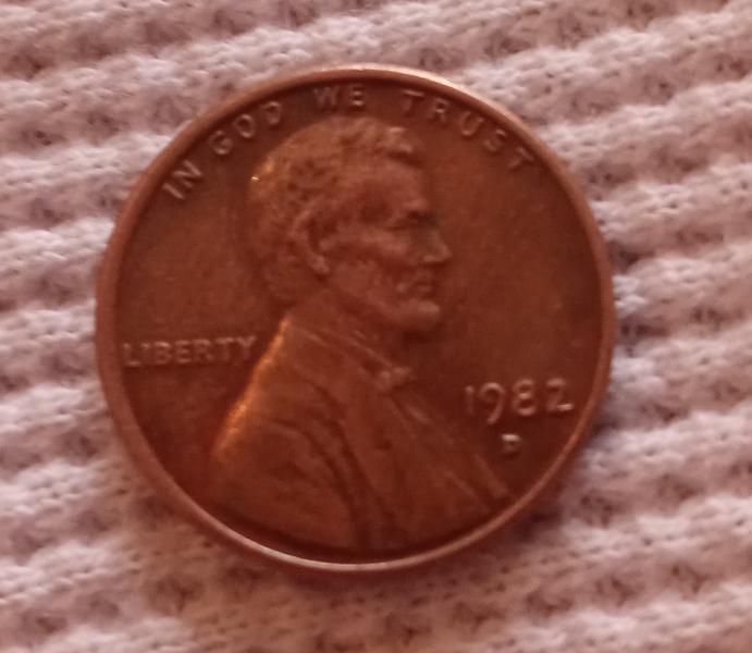 1982 D small print penny that weights 3.1g