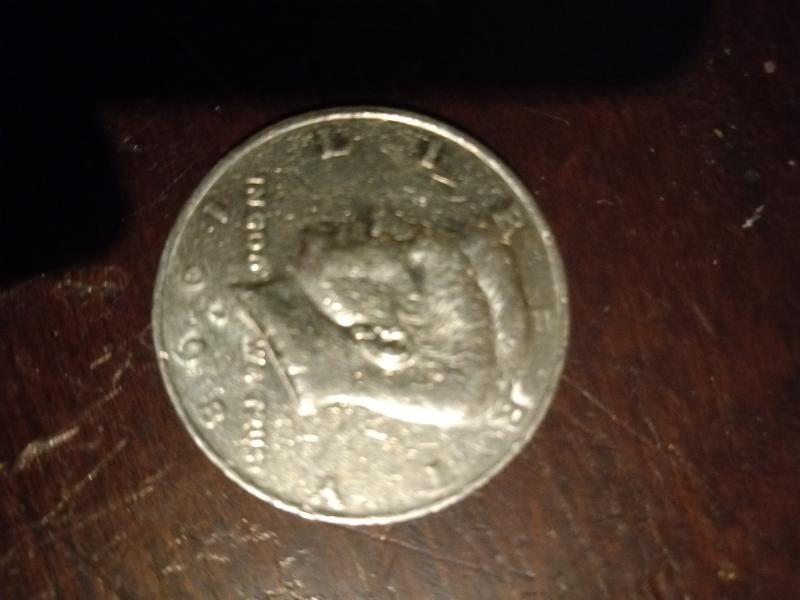 1998 Kennedy half dollar is double dyed on…