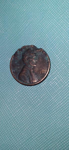 1986 D penny with damage weighing 2.5