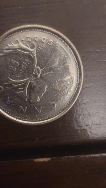 2005 canadian quarter. "25" is slanted whereas "cents"&hellip;