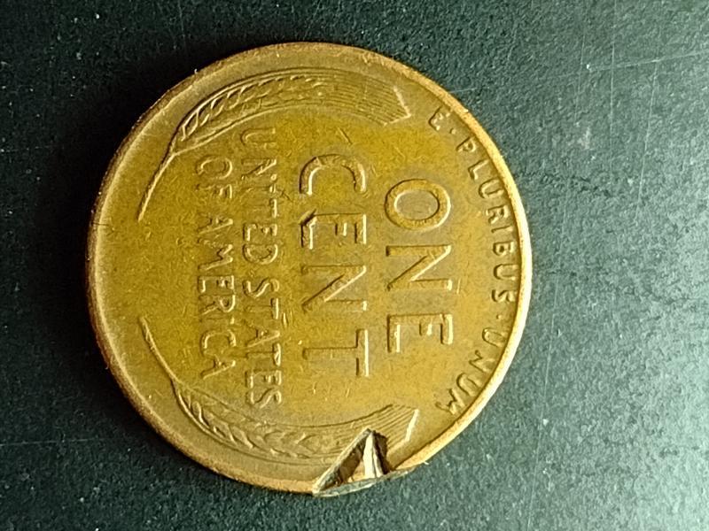 1942 D wheat penny with some kind of&hellip;
