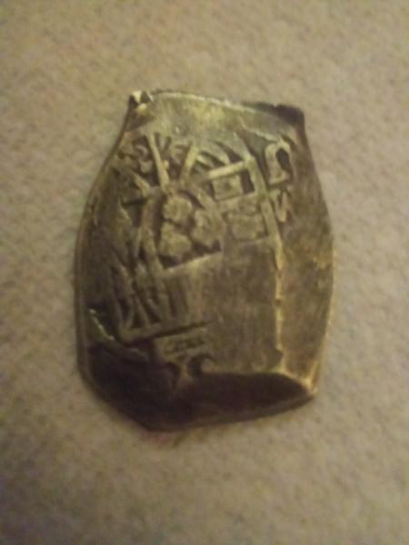 Looks like coin, it's heavy,it's got like cross with different&hellip;