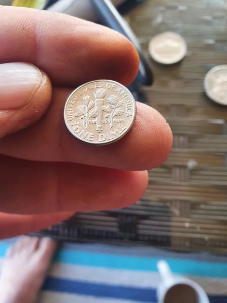 1999 D Dime Coin, with different DOTS on…