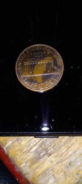 1977 U.S. Penny Mint mark D Colorization abnormal??