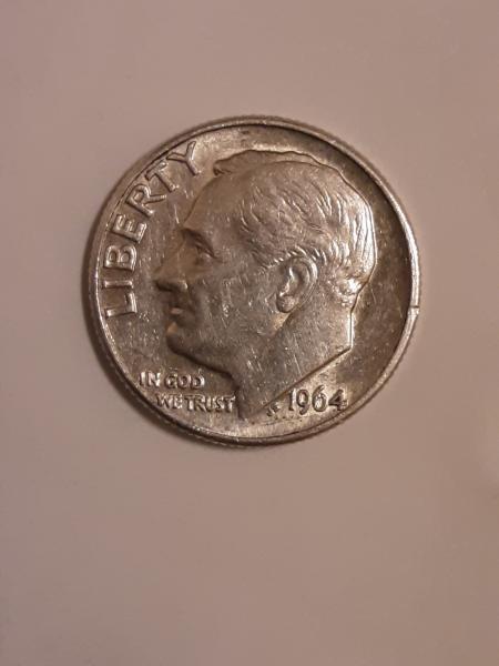 1964D dime. It's not tarnished, weighed 2.4 g
