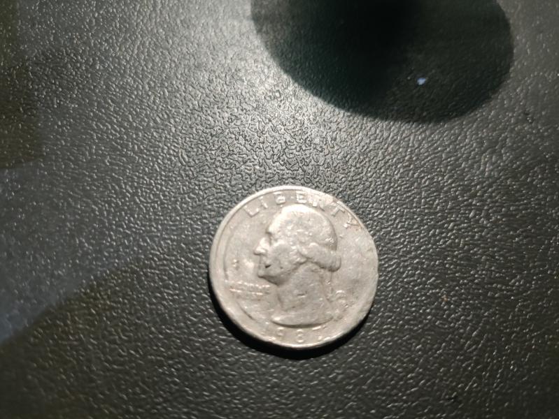 1992 quarter with damage. Unsure if after or…