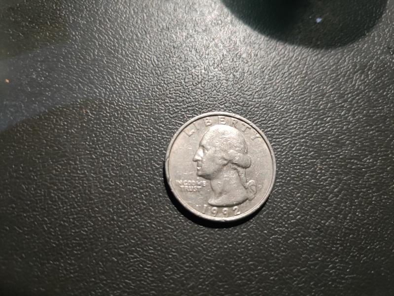 1987 quarter. Unsure of damage