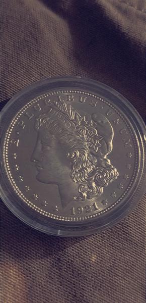 1921 silver dollar with 5 on it