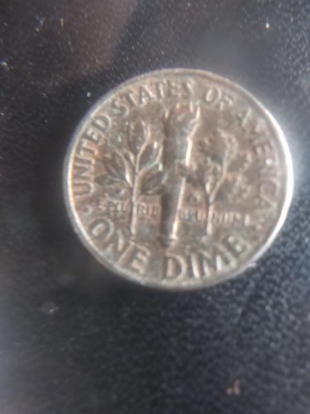 Was this dime struck on a penny plachet