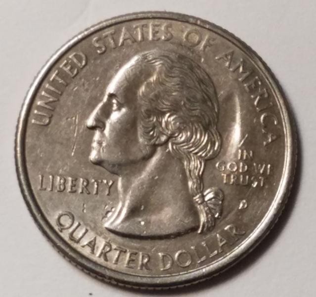 On the back of the coin there is…