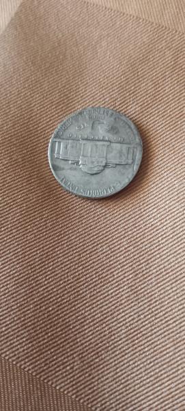 1974 error nickle stamped with a quarter as…