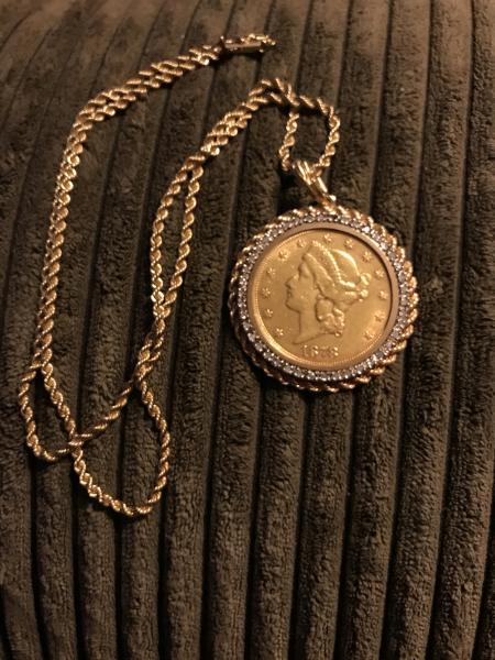 1878 Gold $20.00 coin with around 40 diamonds around it&hellip;