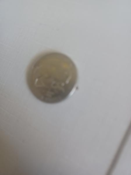A 2005 nickel with the man head almost off and&hellip;