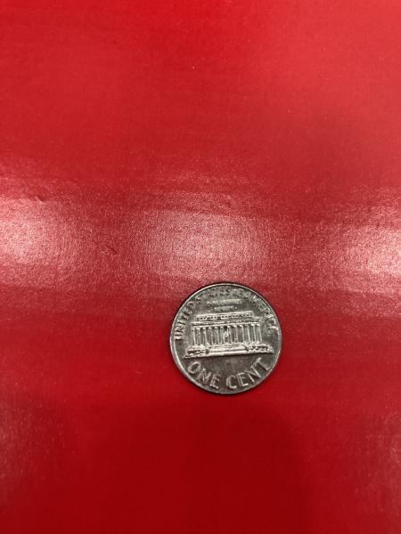 1970-D penny stamped on a dime planchette mint&hellip;