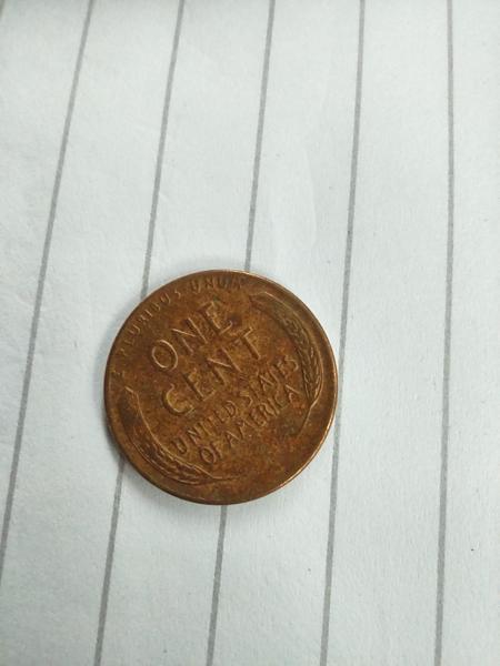 1956 D penny l of liberty on edge.…