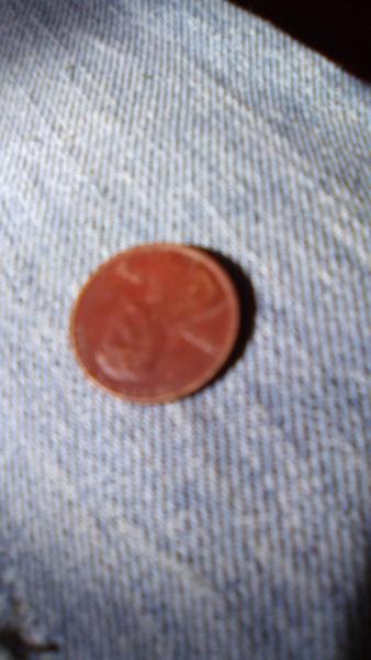 A penny that is a weird reddish color…