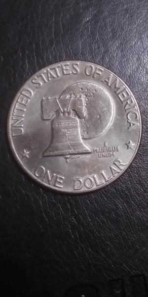 1776-1976 d filled dollar with fg on the neck
