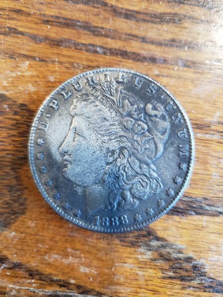 Knockoff 1888 coin with some kind of mint mark