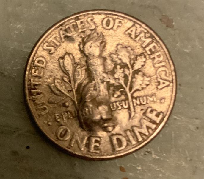 2004D dime with no marks on the face side but&hellip;