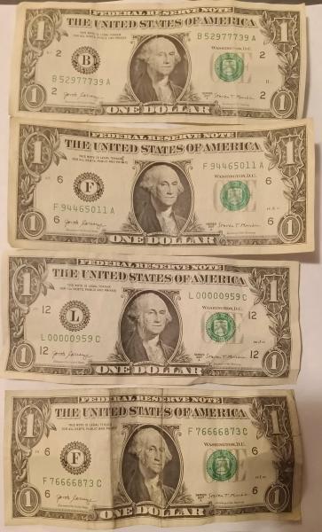 There are a total of eight $1 notes…