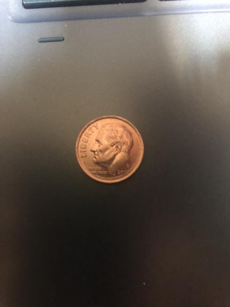 2012 d mint dime with the error running…