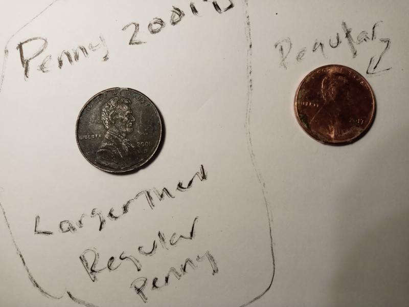 The penny is a 2001 D its black&hellip;