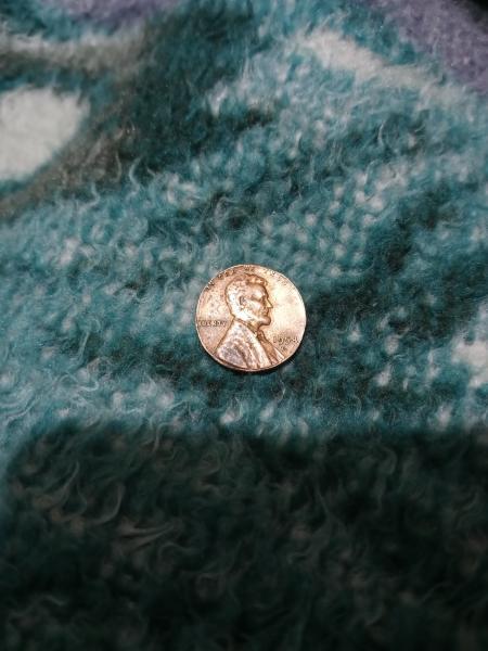 1958 d it also have small letter on edge
