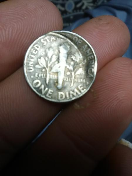 Back side of the coin looks like it's…