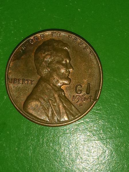 1964 penny with GI over date