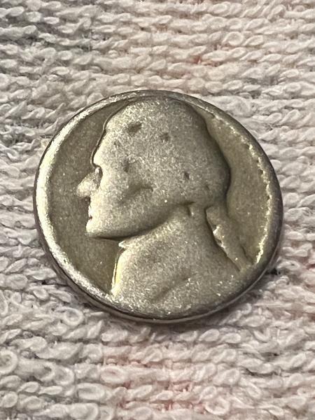 Blank nickel with only Jefferson head outline and&hellip;