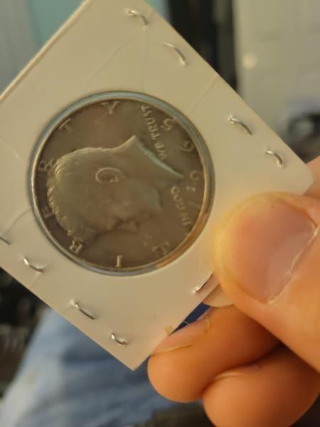 1966 non mint mark. Kenndy half dollar which…