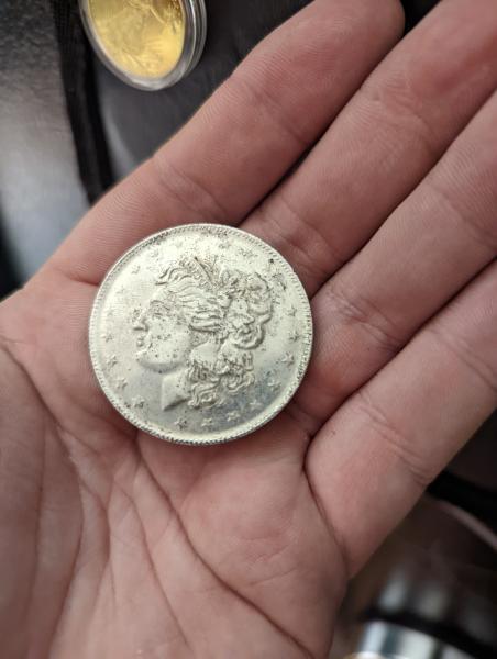 Looks to be a silver dollar but no…