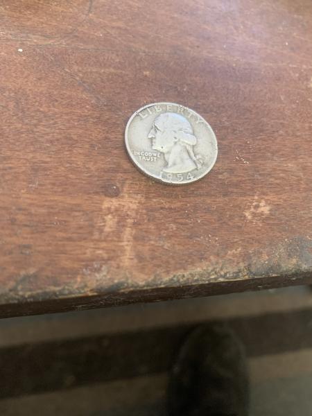 It’s a 1954 quarter with a crack on…