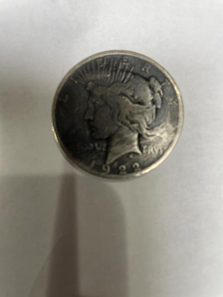 Liberty Silver Dollar 1922. With trust spelled with V