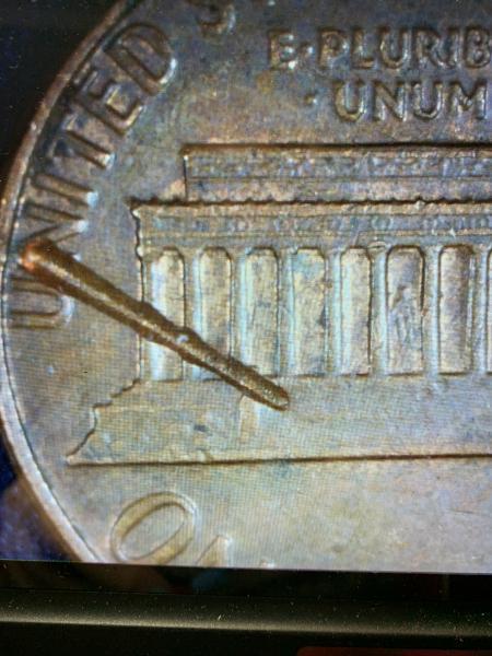 1979 pennie with this mark on both side