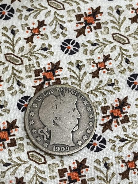 1909 Half dollar with possible error, heavily worn…