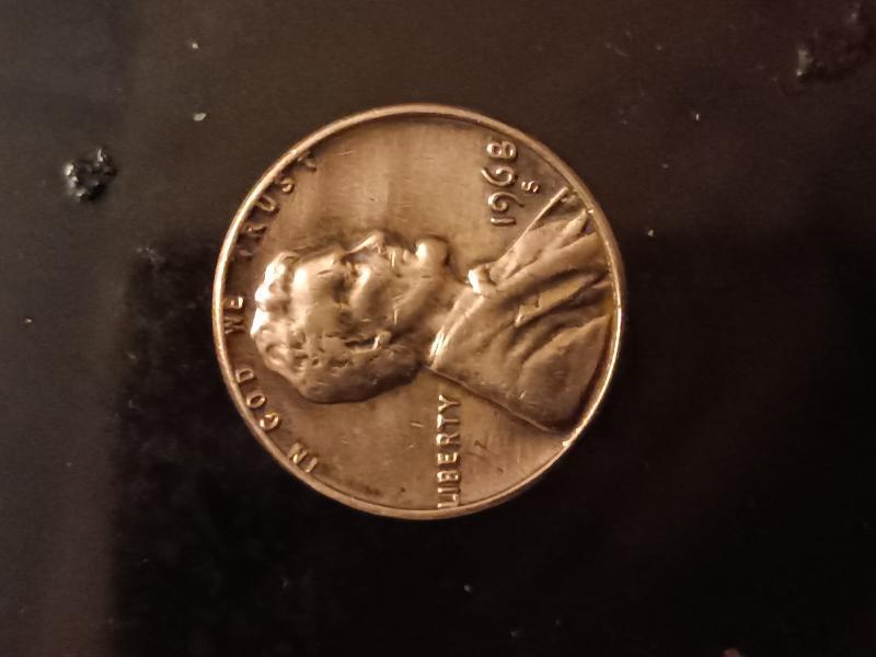 It's a 1968 penny and a 1983 the…