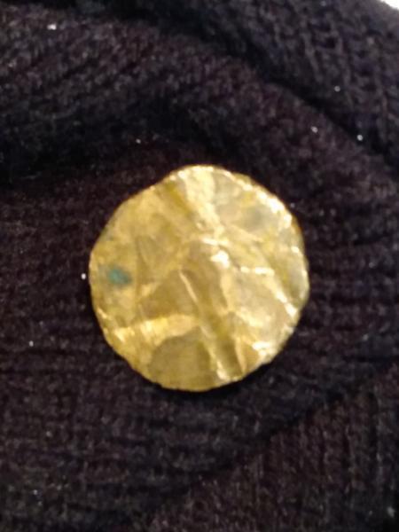 Penny planchet. Has different markings on it. Letters.&hellip;