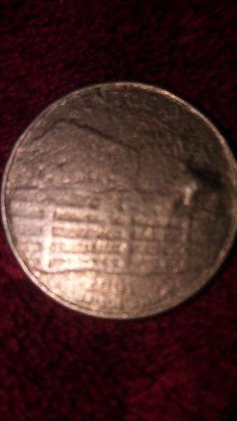 2001 Kentucky state quarter. It had grease on…
