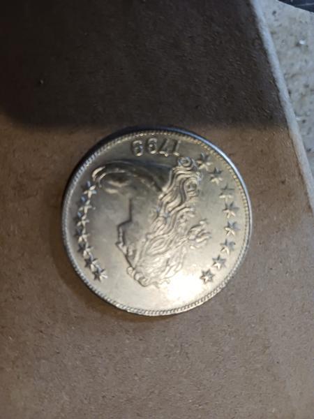 1st is 1799 dollar coin I belive 2nd…
